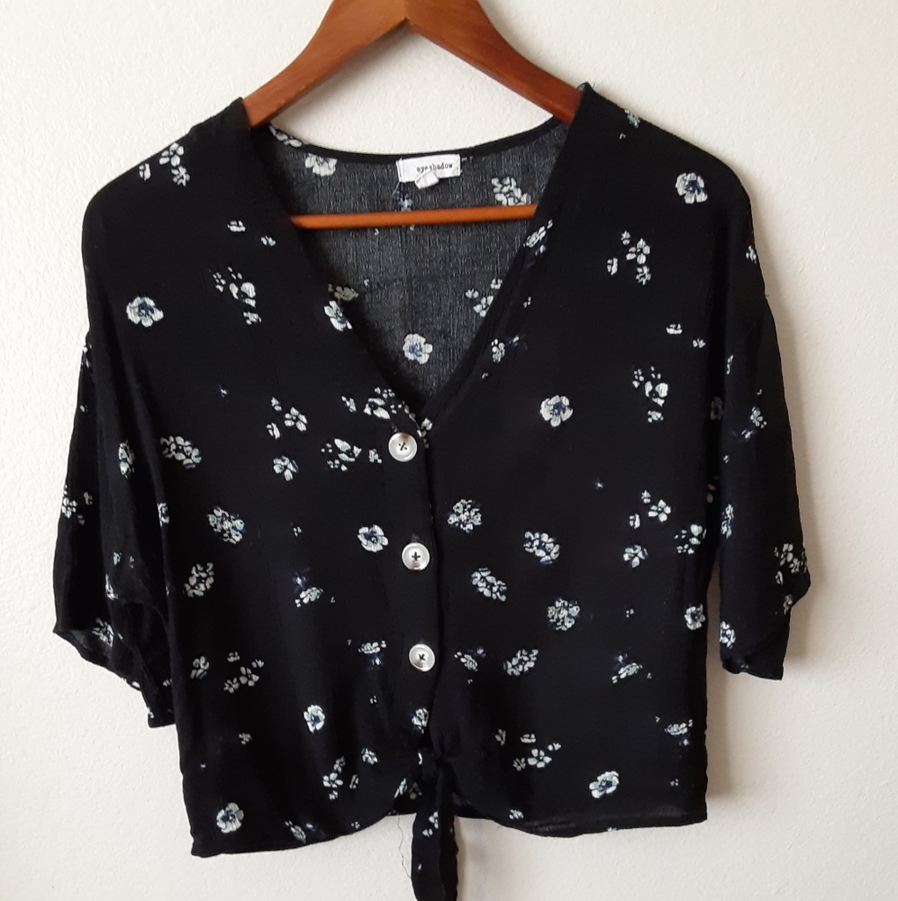 Flowy floral button up blouse with bottom tie.